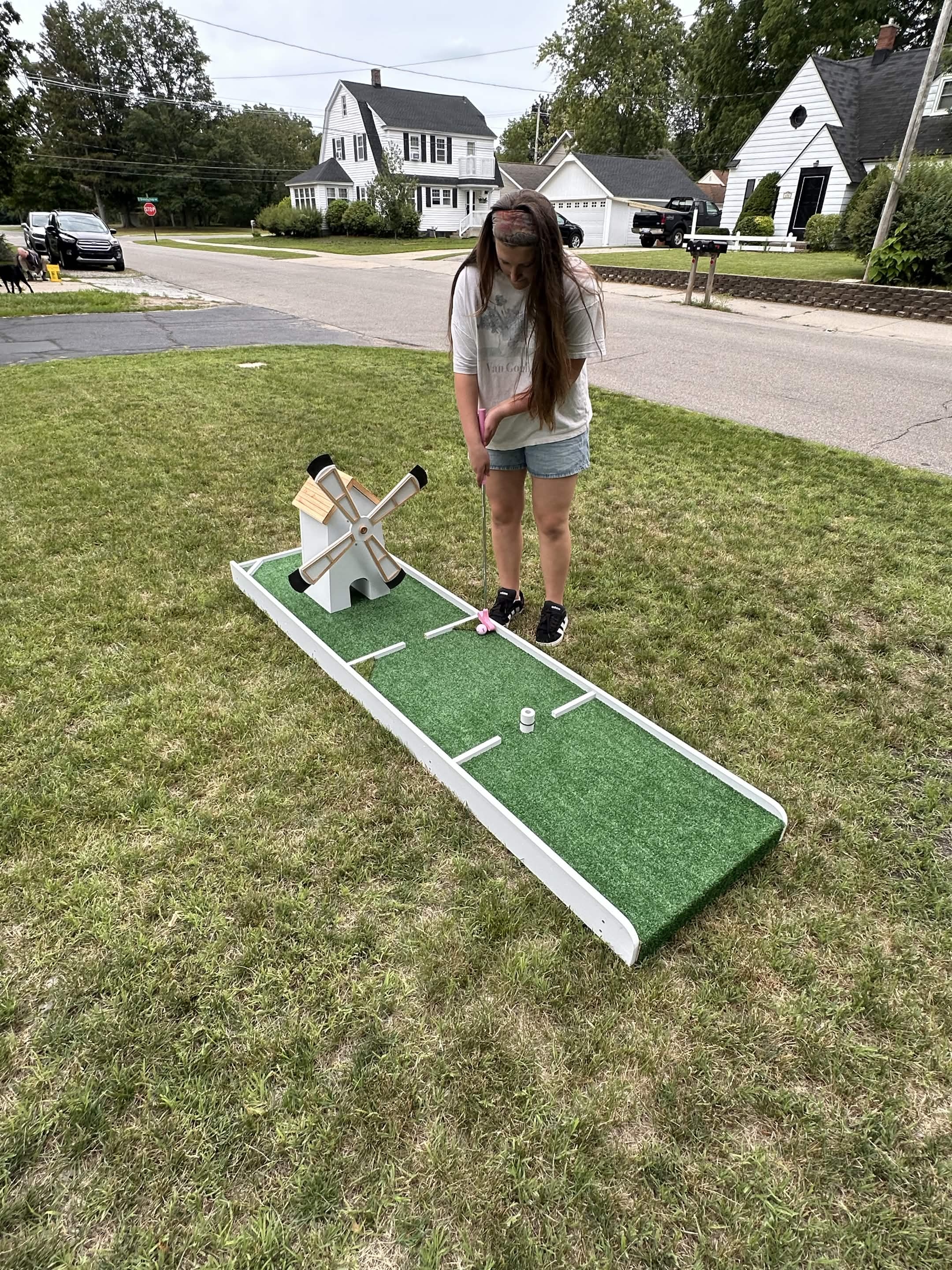 Full Puttin Party course set up in a backyard